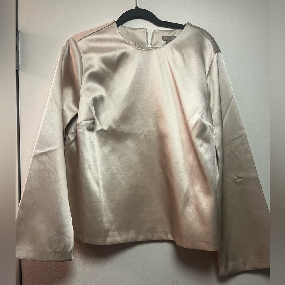 Cream blouse with wide sleeves
